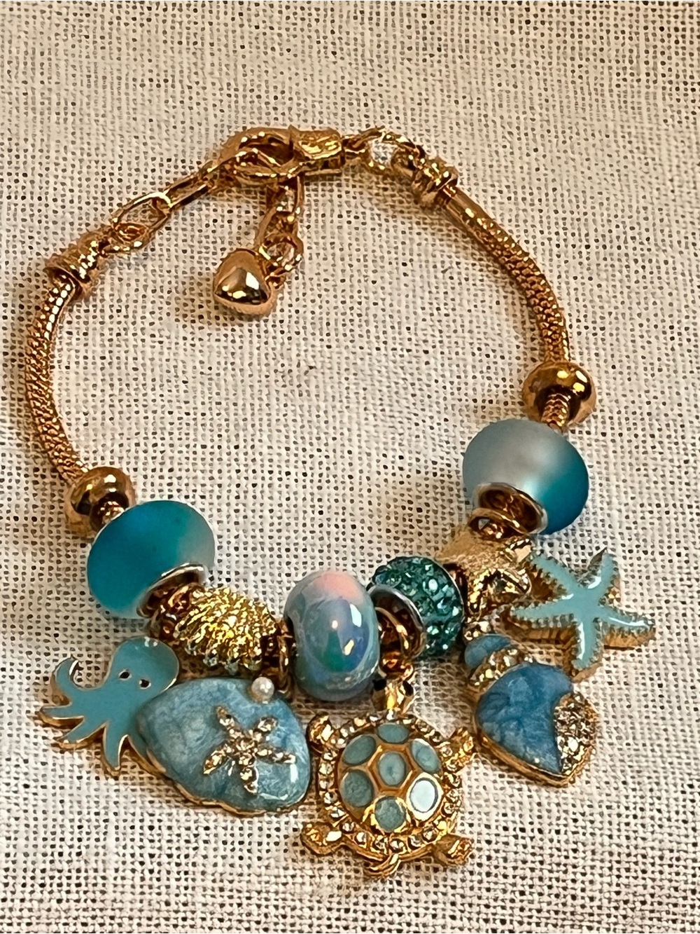 Gold-Tone Ocean Charm Bracelet with Teal Blue Accents - Women Jewelry